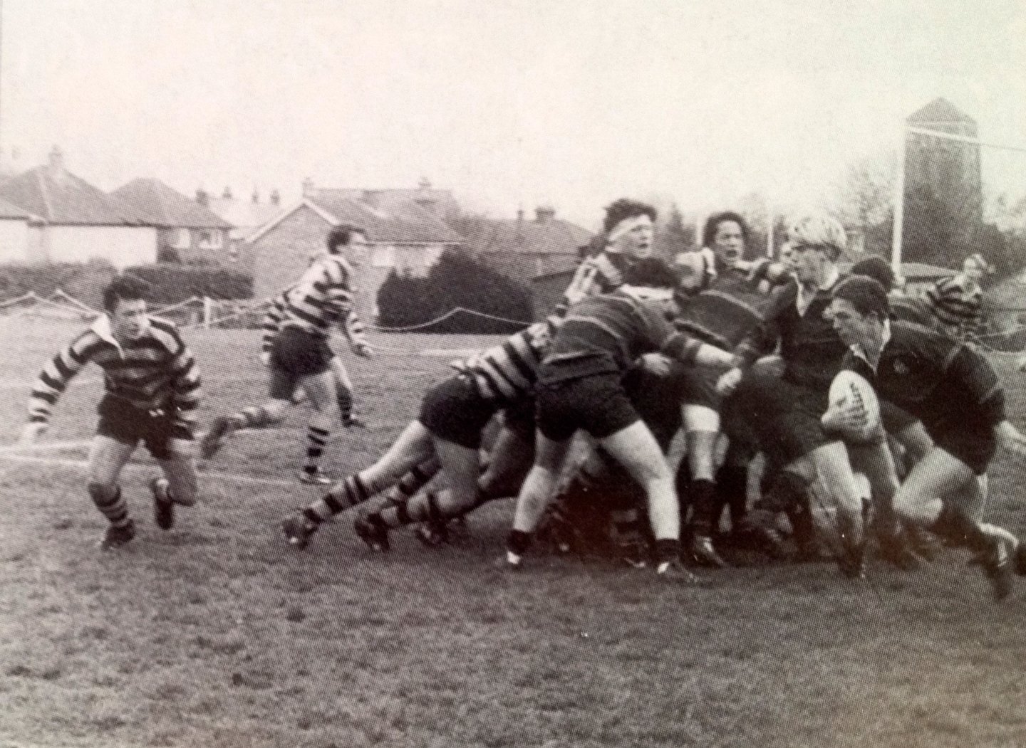 In 2012 I was browsing through the autobiography of @matt9dawson. In the photo section in the middle I came across this shot from the late 1980s. There's Matt launching one of his trademark attacks from the base of the scrum during a match against a 